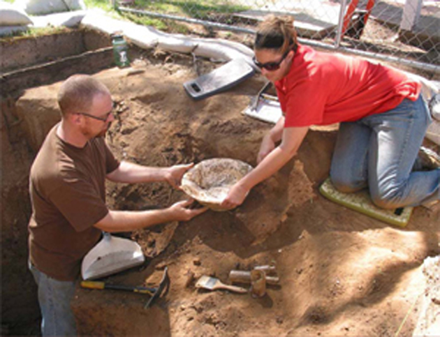Students in SDSU's Department of Anthropology field school assist in excavating the Whaley House cistern.