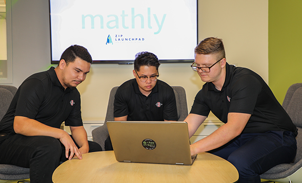 Computer science majors Robert Carpenter,  Reidun Dirawatun and Jeremy Goold working on their math learning app at the ZIP Launchpad. (Photo: Scott Hargrove/SDSU)