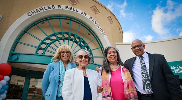 Mary Bell (second from left) posed outside Bell Pavilion with her children (from left) Karen Shirley, Roslyn Bell and Charles B. Bell III. (Photo: Rachel Crawford)