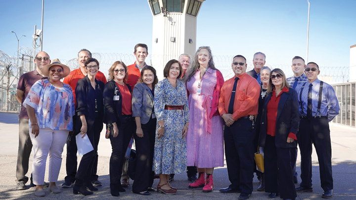 SDSU President Adela de la Torre and Superintendent of the CDCR Office of Correctional Education Shannon Swain (center) visit the VISTA program alongside leadership from SDSU, CDCR and Centinela State Prison.