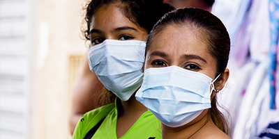 Individuals in masks