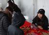 SDSU Center for Autism volunteers helped attendees build models of brain neurons with pipe cleaners.