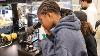 One of Beach’s students gets a microscopic view of algae samples in Zuniga’s lab (Bryana Quintana / SDSU)
