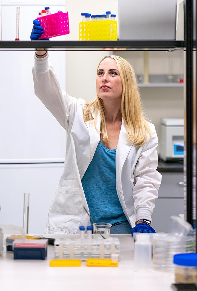 Student working with samples in lab