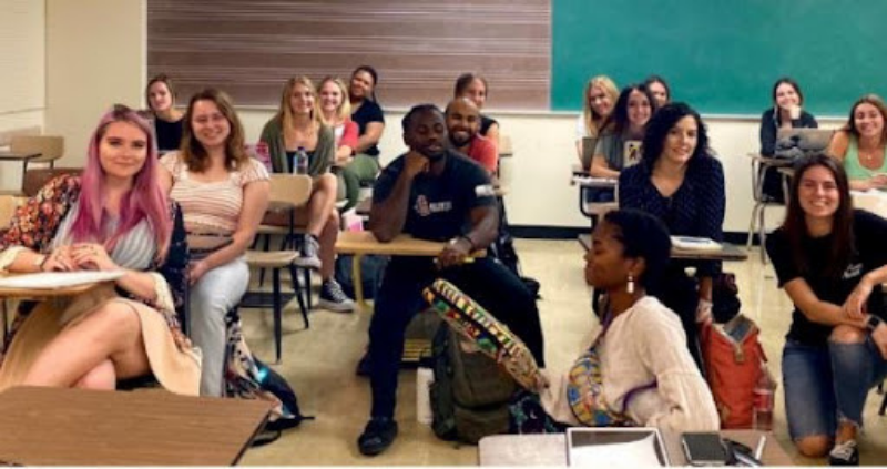 GPS program ambassador’s member performing a musical item at one of the classes at SDSU