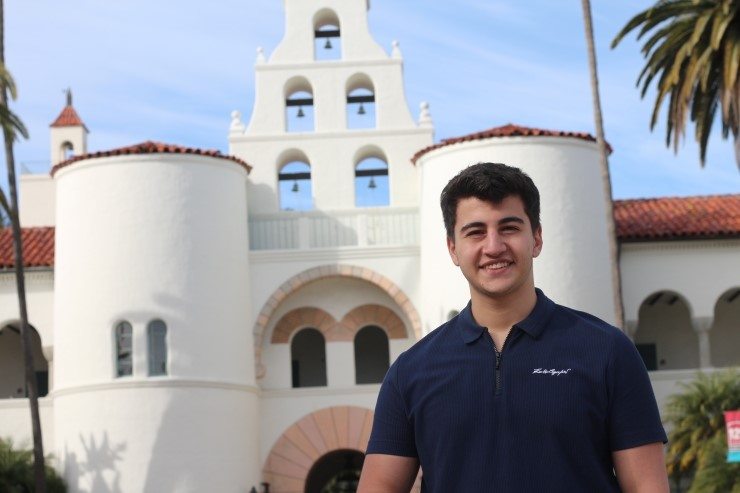 Vagif Qiyasli stands in front of the bell tower at San Diego State University. He is the only student from Azerbaijan on campus this spring.