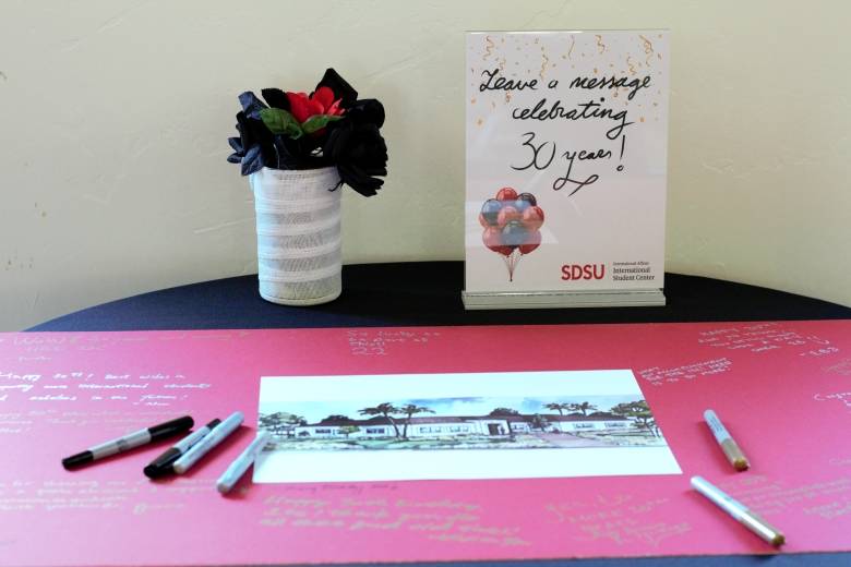 Attendees signed a commemorative display at the ISC's 30th anniversary.