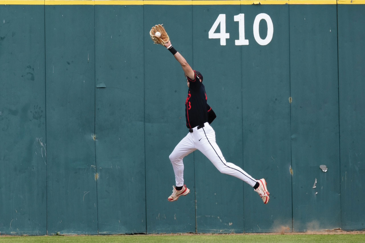 Jake Jackson jumping to catch a baseball