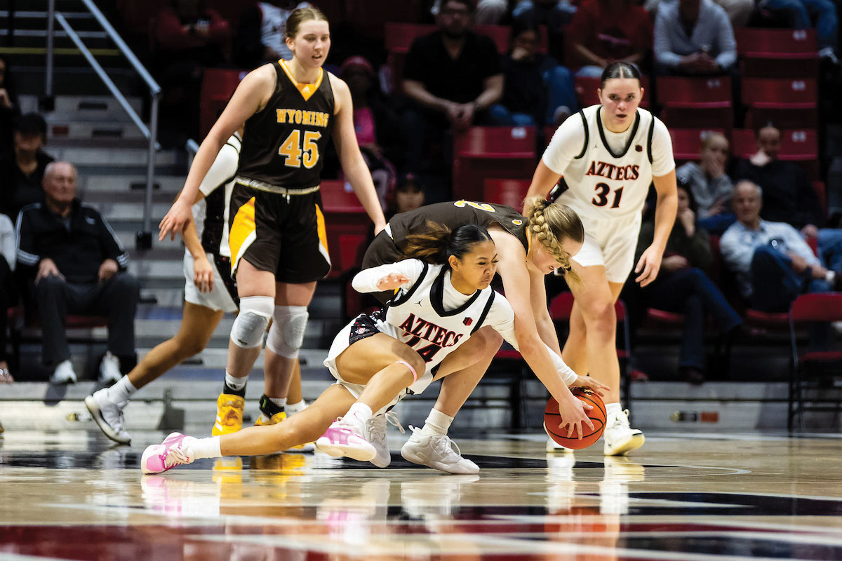 Naomi Panganiban sliding to grab a basketball