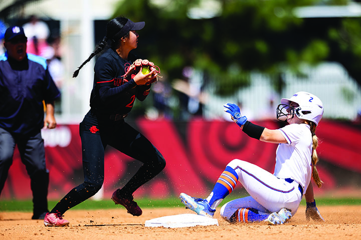 2 women playing softball
