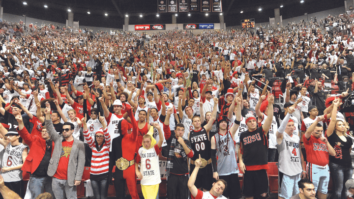 Crowd of people cheering