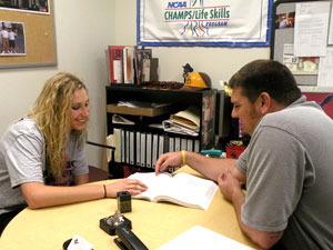 Women's basketball player Lindsay Leo and academic advisor Willie Judd
