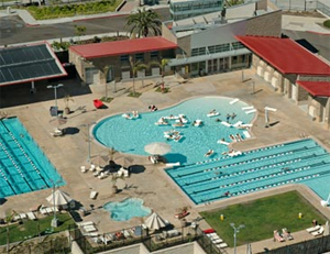 An aerial view of the Aztec Aquaplex showcasing its solar panels and more.