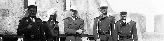 Several student actors dressed in legionnaire costumes from the 1940 SDSU parody of Beau Geste.