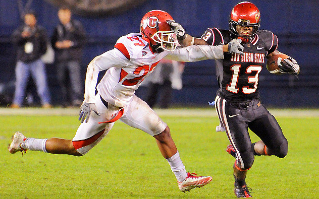 MWC Freshman of the Year Ronnie Hillman fights off a Utah defender.
