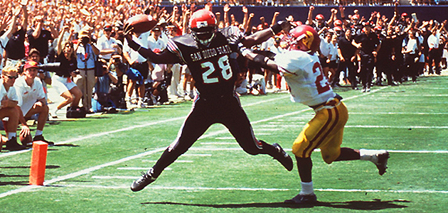 Marshall Faulk evades a tackle during an SDSU football game against University of Southern California in 1992.