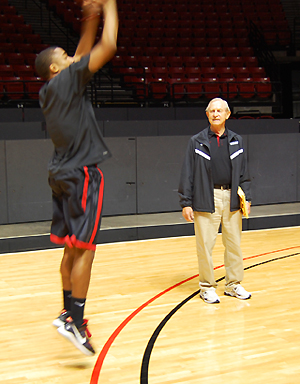 Al Schaffer (right) helps freshman LaBradford Franklin with three-point shooting.