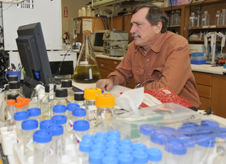 Carrano in his chemistry lab where his research focuses on the biology of iron.
