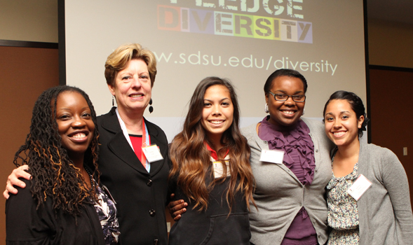(from left) Azizi James, Sandra Cook, Samantha Stauber, Ekemerire Adigheji, and Karina Parra pose for a photo.