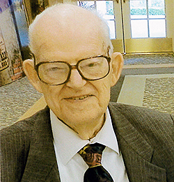 Donald Wilson headshot located in library