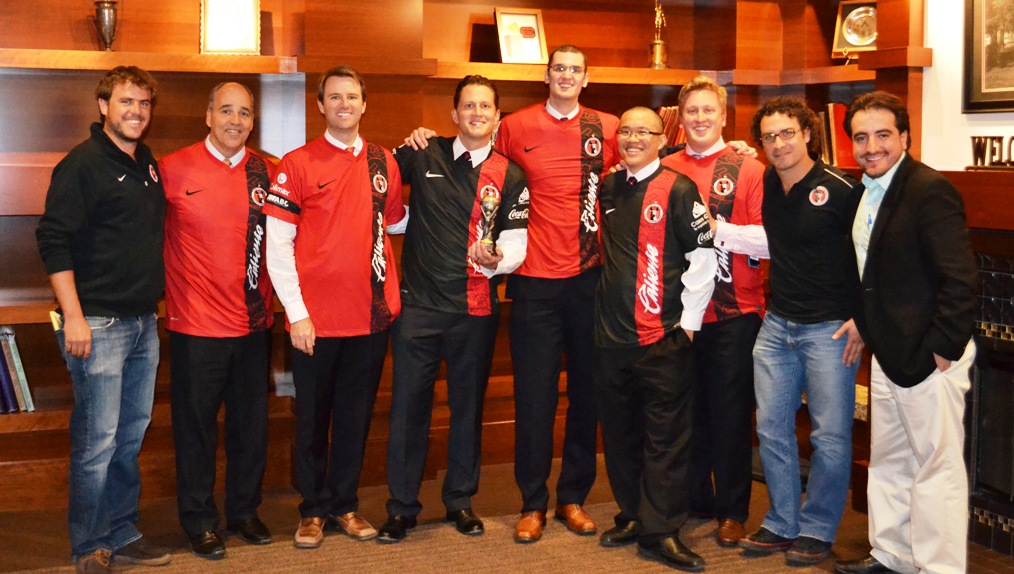 The SDSU Sports MBA Program winning team with College of Business Dean Michael Cunningham and executives from the Xolos.