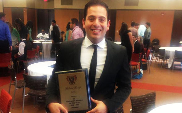 Benji poses with his Greek Man of the Year award.