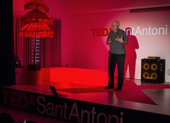 Tom Novotny speaks about his research at a TEDx event on the environment in Ibiza, Spain.