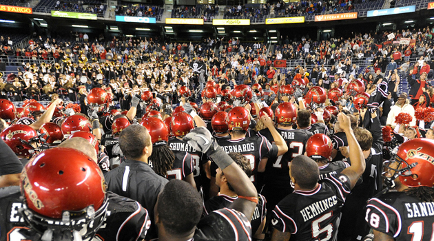 The SDSU football team celebrates a victory at Qualcomm Stadium.