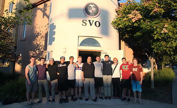 Members of Kappa Sigma outside of the SVO house. Photo courtesy of Monica Linzmeier.