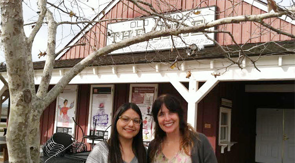 From left: SDSU student and Cygnet Theatre intern Cristal Mejia-Arrechea with Edith Frampton outside the Cygnet Theatre.
