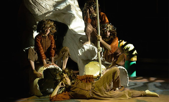 Actors on stage in costumes designed my MFA student Jordyn Smiley.
