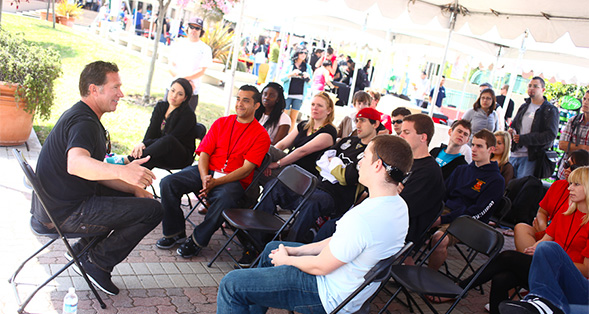 Thom McElroy, co-founder of Volcom, speaks to students at SDSU's annual Entrepreneur Day.