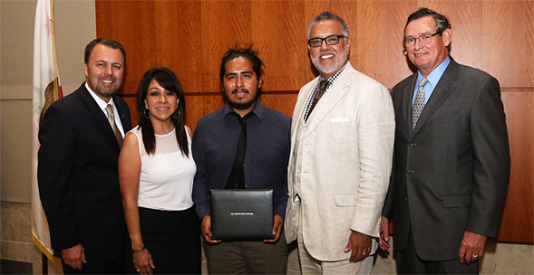 Juarez (center) at the CSU Trustees Award ceremony.