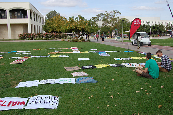 Students read and observe at the Poetic Picnic.