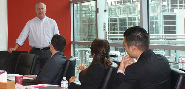 Robert Fischbach ('90) speaks with SDSU students.