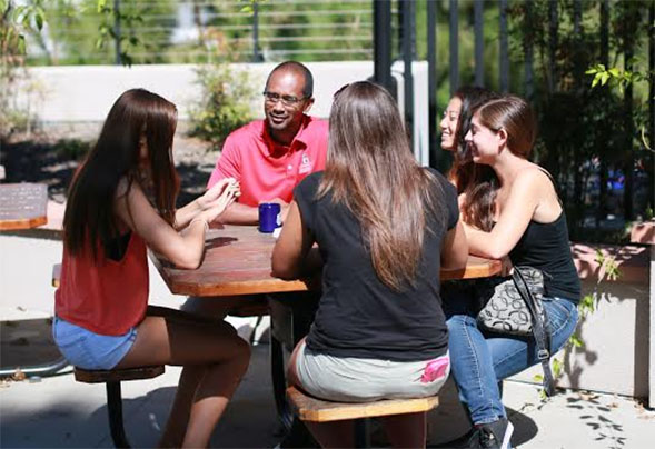Professor Paul Minifee with students.