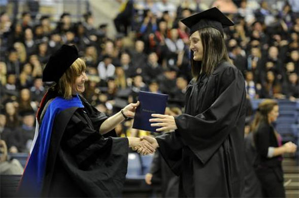 Norma Bouchard, left, at the University of Connecticut Commencement.