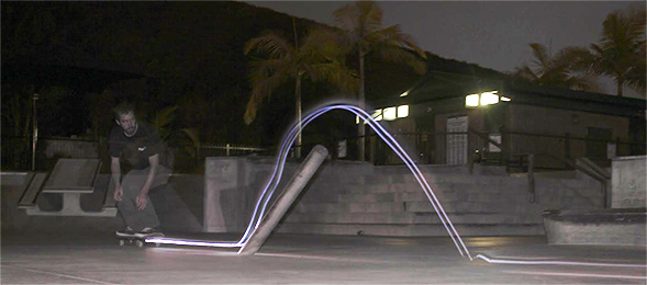 A skate boarder using ShredLights.