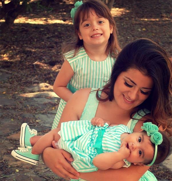 Vanessa Cardenas shares a sweet moment with her daughters.
