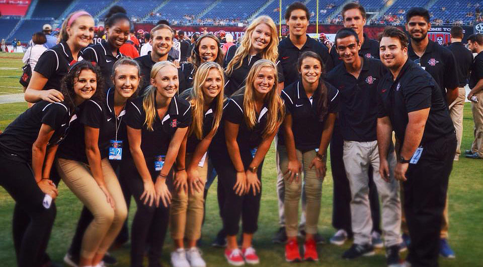 Aztec Athletics marketing interns at Qualcomm Stadium in 2014.