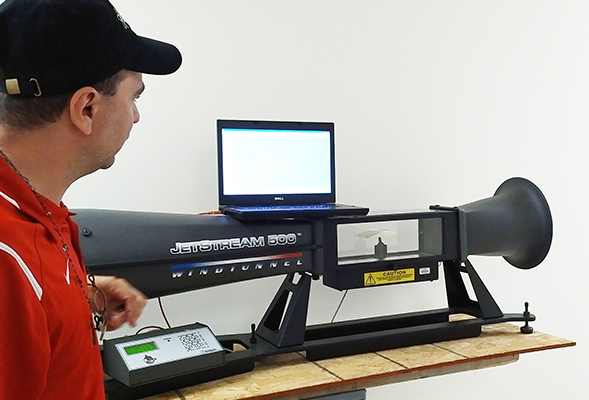 A PLTW instructor demonstrates the Jetstream 500 windtunnel