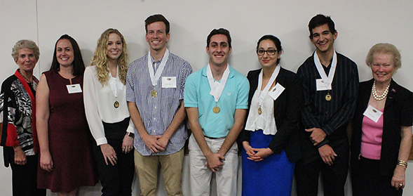 Members of Mortar Board graduating in December pose for a photo at the Faculty and Staff Appreciation Dinner. (Credit: Jane K. Smith Cap &amp; Gown chapter)