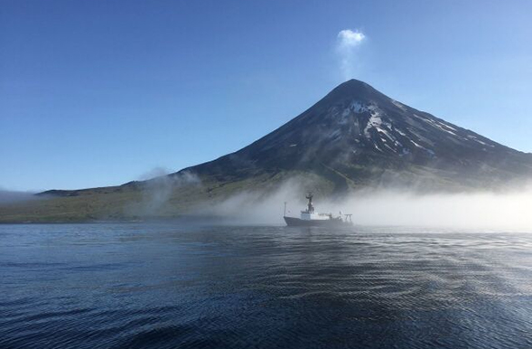 R/V Oceanus anchored near Chuginadak Island. (Photo: Genoa Sullaway)