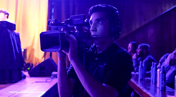 An SDSU student filming.