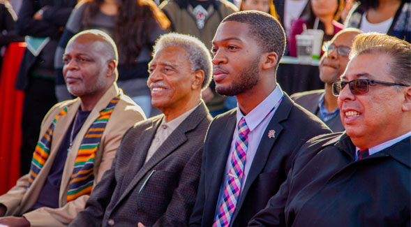 Associated Students President Chimezie O. Ebiriekwe (second from the right) and Vice President for Student Affairs Eric Rivera (far right) at the opening of the Black Resource Center.