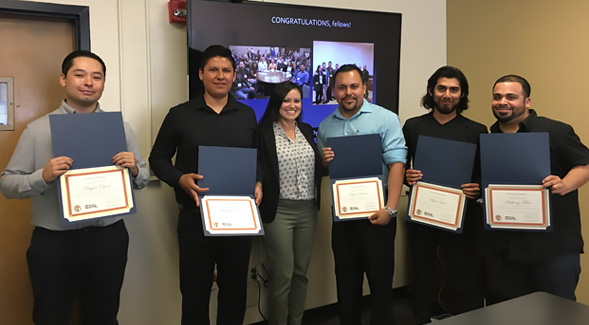 Left to right: Bryan Osorio, Alejandro Arias, SDSU education professor Marissa Vasquez, Oscar Duran, Ulises Leal and Anthony Mota