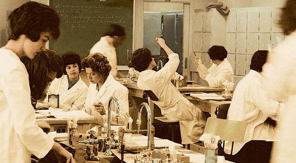 Women conduct experiments in a microbiology laboratory in the 1950s.