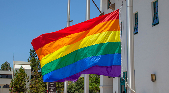 A photo from the 10th annual Rainbow Flag Raising Ceremony at SDSU in 2017.