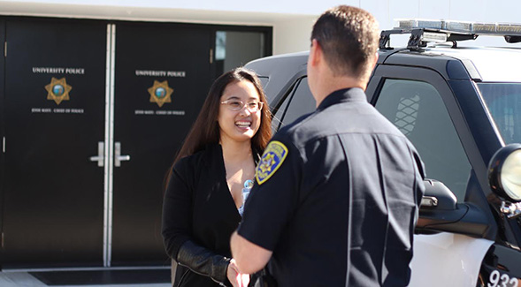 Graduate student intern Victoria Dumon and Lt. Greg Robertson