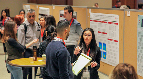 SDSU student shares her research at annual Student Research Symposium.
